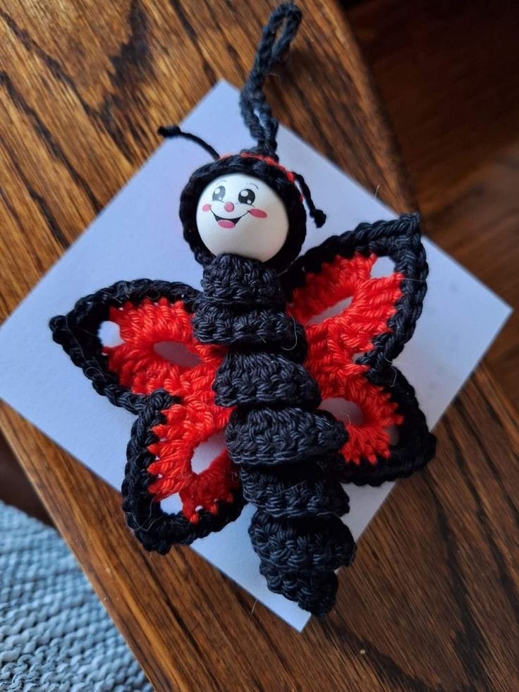 crochet butterfly ornaments with wooden heads 4