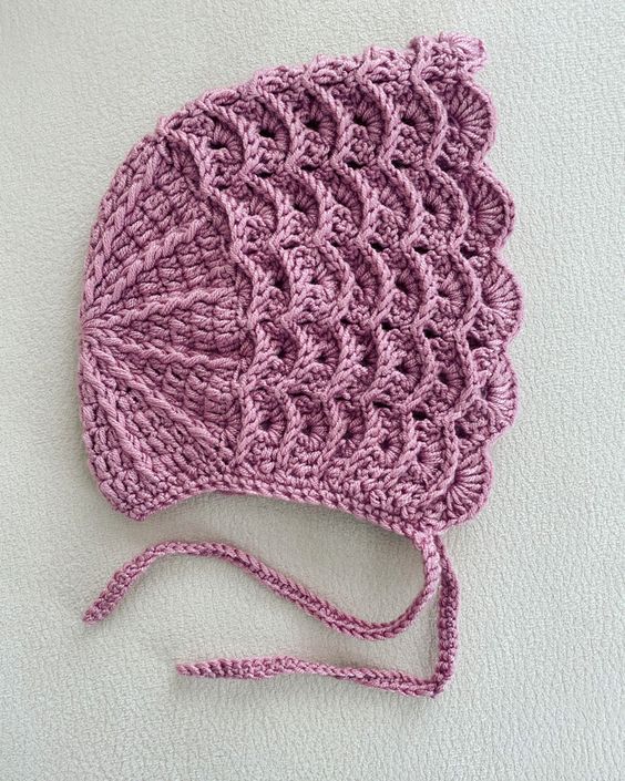crocheted bonnet for a newborn 7