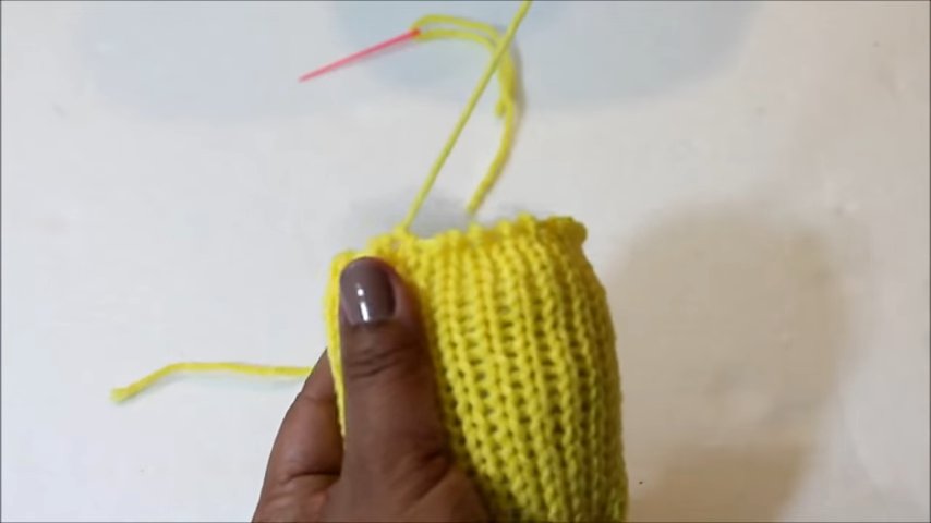 how to weave a kitten with a loom 9