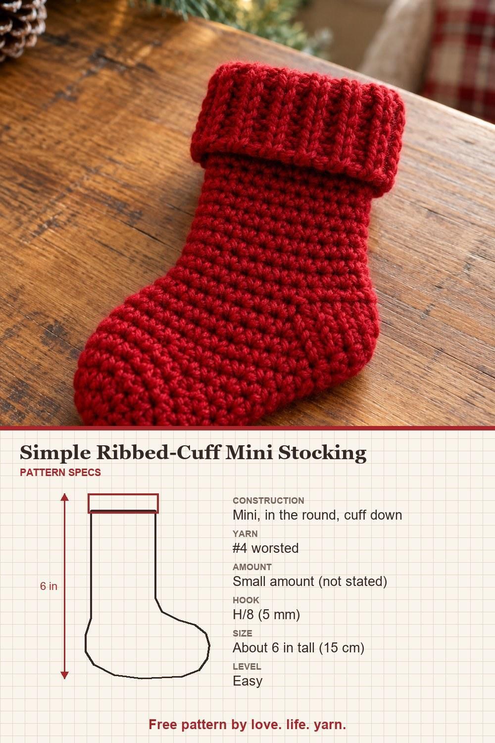 Plain red mini crochet stocking with a folded ribbed single crochet cuff, with pattern specs: size, yarn and hook